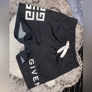 Givenchy baby swim trunks. Size 9 months. Runs a little small.